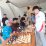 Fide Master Reynard Kristopher tak terkalahkan di Fun Catur Simultan Noboru Coffee Tangerang, 24 Agustus 2025, dalam acara CSR yang meriah.